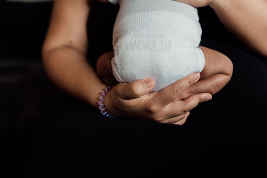 newborn baby being held #doulainPittsburgh #PittsburghDoula #postpartumdoulaPittsburgh 