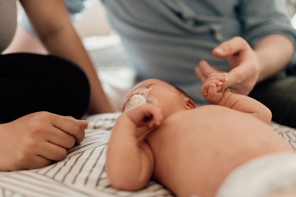 Newborn baby holding hand with parent #doulainPittsburgh #PittsburghDoula #postpartumdoulaPittsburgh 